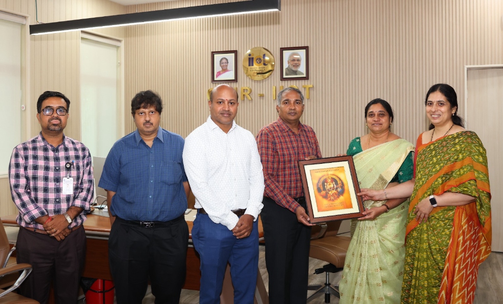 Presenting memento to Director CSIR-IICT